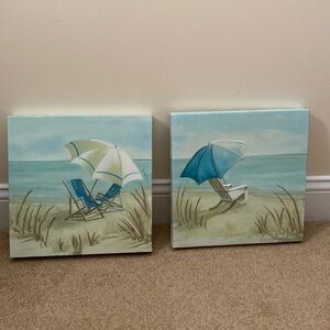 Two beach wall hangings